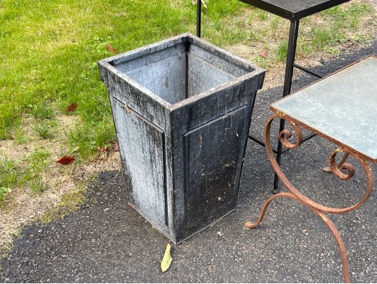 Assorted Collection Of Minimalistic Tables And Planters