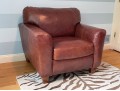 Luxurious Leather Upholstered Club Chair With Ottoman
