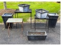 Assorted Collection Of Minimalistic Tables And Planters