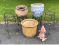 Assorted Planters With Stands And A Garden Gnome