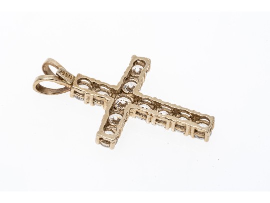 A 14K Yellow Gold Crucifix Pendant Set With CZ Stones
