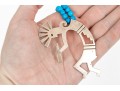 Sterling Silver Impactful Large Kokopeli Pendant, Displayed On A Blue Glass Bead Necklace