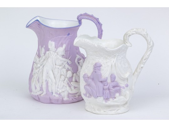 Two Antique English Earthenware Relief Pitchers