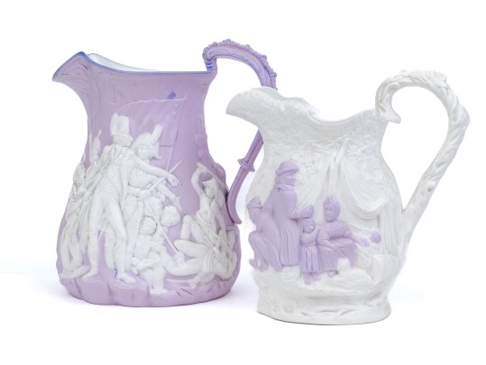 Two Antique English Earthenware Relief Pitchers