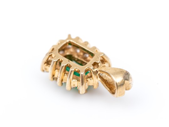 14k Yellow Gold Pretty Emerald Cut Emerald And Diamond Halo Pendant