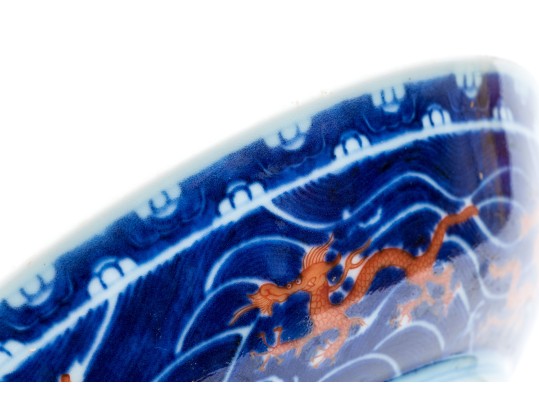Chinese Porcelain Dragon Bowl With Underglaze Blue And Copper Red Enameled Decoration