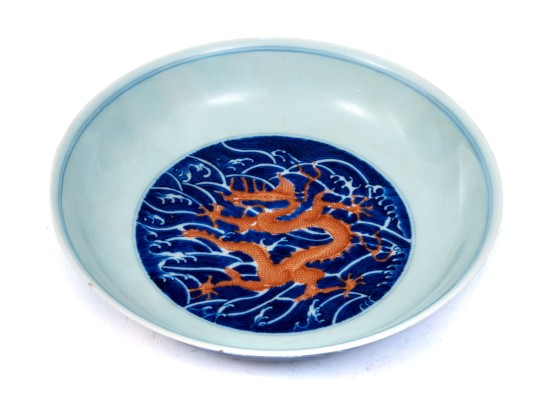 Chinese Porcelain Dragon Bowl With Underglaze Blue And Copper Red Enameled Decoration