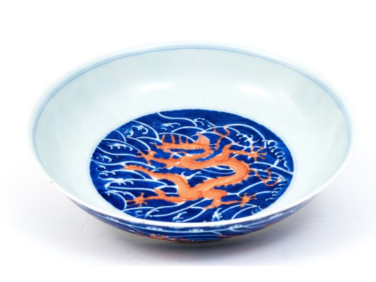 Chinese Porcelain Dragon Bowl With Underglaze Blue And Copper Red Enameled Decoration