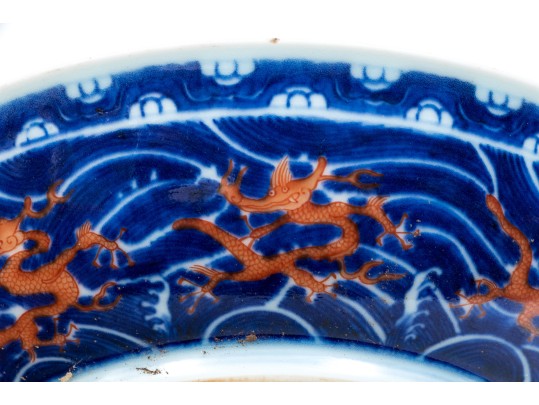 Chinese Porcelain Dragon Bowl With Underglaze Blue And Copper Red Enameled Decoration