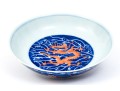 Chinese Porcelain Dragon Bowl With Underglaze Blue And Copper Red Enameled Decoration