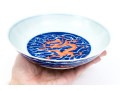 Chinese Porcelain Dragon Bowl With Underglaze Blue And Copper Red Enameled Decoration