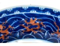 Chinese Porcelain Dragon Bowl With Underglaze Blue And Copper Red Enameled Decoration