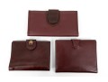 Collection Of Three Burgundy Wallets, Including Etienne Aigner