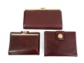 Collection Of Three Burgundy Wallets, Including Etienne Aigner