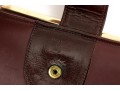Collection Of Three Burgundy Wallets, Including Etienne Aigner