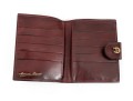 Collection Of Three Burgundy Wallets, Including Etienne Aigner