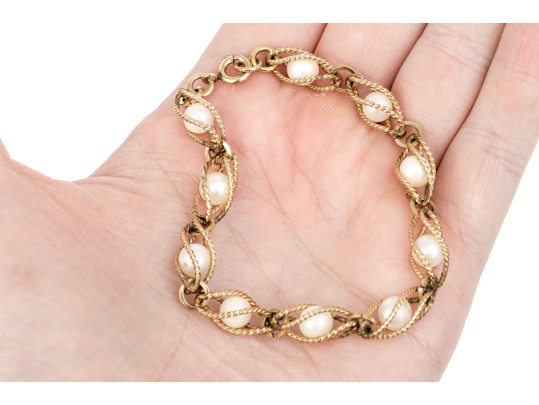 Collection Of Assorted Gold Filled Jewelry Pieces, Including Bracelets And A Stick Pin