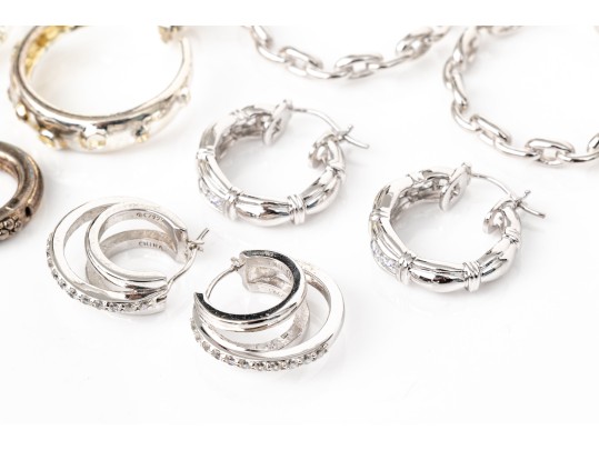 Six Pairs Of Sterling Silver Hoop Earrings
