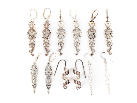 Six Pairs Of Sterling Silver Dangle Earrings