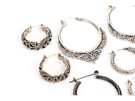 Collection Of Assorted Sterling Silver Balinese Motif Hoop Earrings