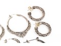 Collection Of Assorted Sterling Silver Balinese Motif Hoop Earrings
