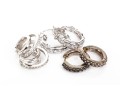 Six Pairs Of Sterling Silver Hoop Earrings