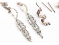 Six Pairs Of Sterling Silver Dangle Earrings