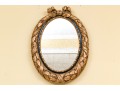 Decorative Gilt Finished Composition Oval Mirror