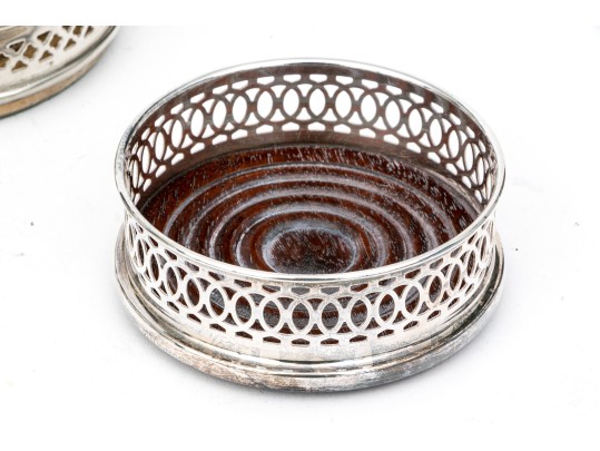 Collection Of Eight Fine Silverplate Wine Bottle Coasters