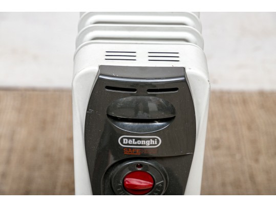 Collection Of Space Heaters And A Ubii Exercise Machine