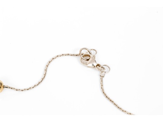 Sterling Silver Striking Pair Of Ball Motif Necklaces