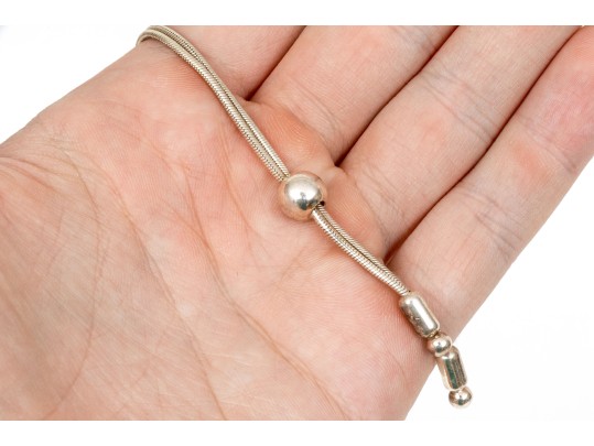 Sterling Silver Striking Pair Of Ball Motif Necklaces