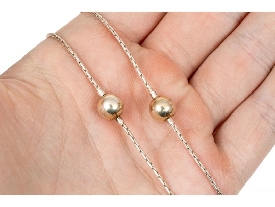 Sterling Silver Striking Pair Of Ball Motif Necklaces