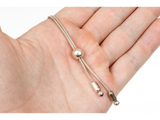 Sterling Silver Striking Pair Of Ball Motif Necklaces