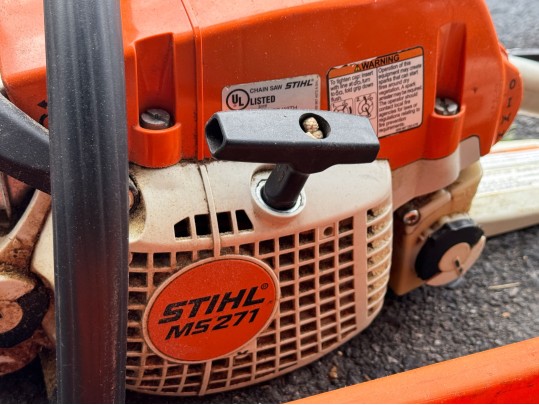 Stihl Chainsaws And Polesaw With A RedMax Weedeater