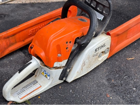 Stihl Chainsaws And Polesaw With A RedMax Weedeater