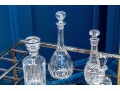 Crystal Decanters And Bowl Including Steuben, Baccarat, And Waterford