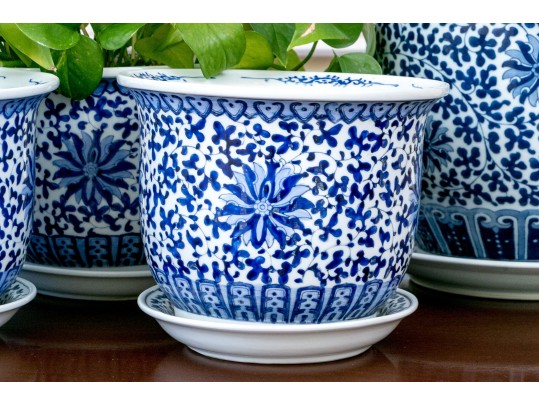 Collection Of Five Chinese Blue And White Porcelain Planters On Underplates