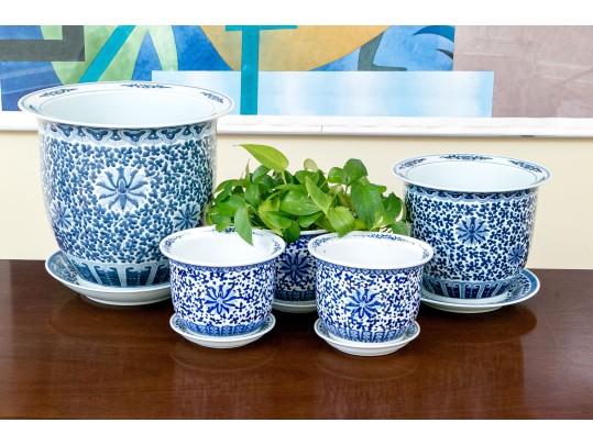 Collection Of Five Chinese Blue And White Porcelain Planters On Underplates