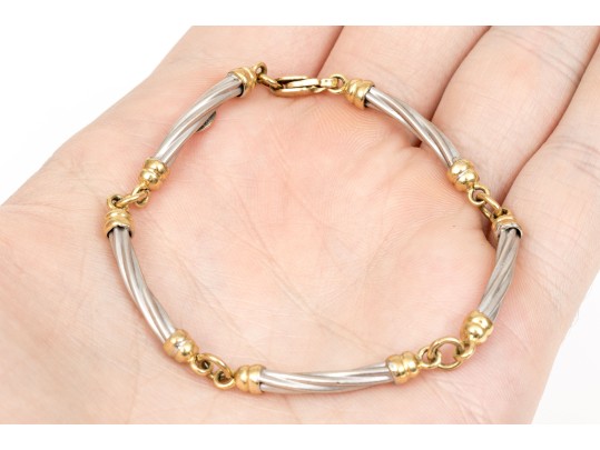 14k Two Tone Striking Twisted Tube Link Bracelet, Capped With Ribbed Ends