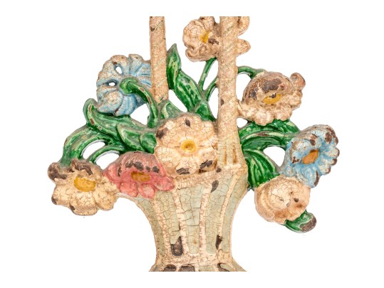 Two Antique Cast Iron Floral Basket Form Doorstops