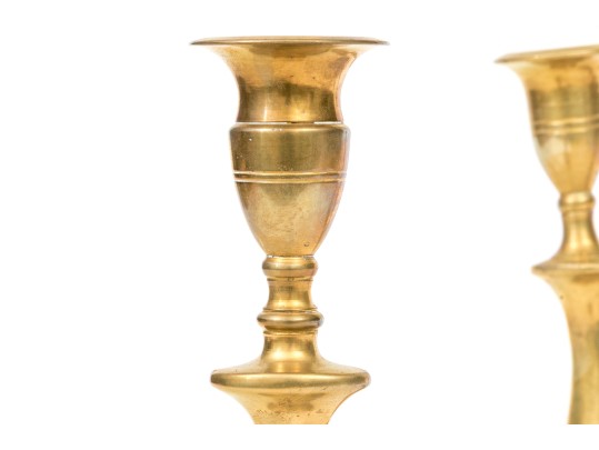 Compatible Set Of Four Antique Brass Candlesticks