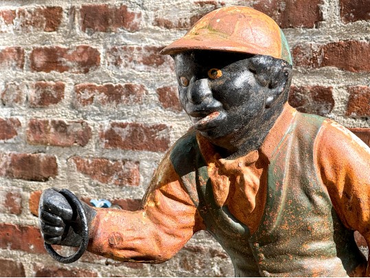 Antique Cast Iron Garden Jockey On Green Plinth