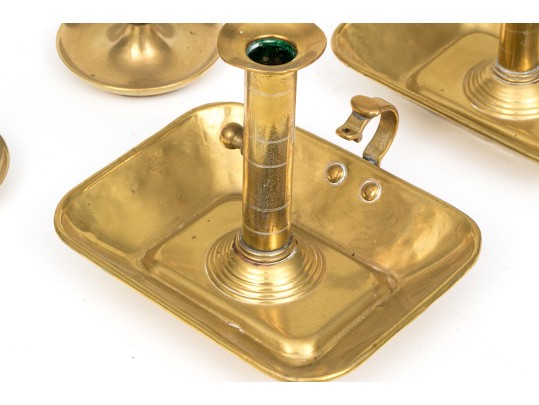Four Brass Candlesticks And Chambersticks