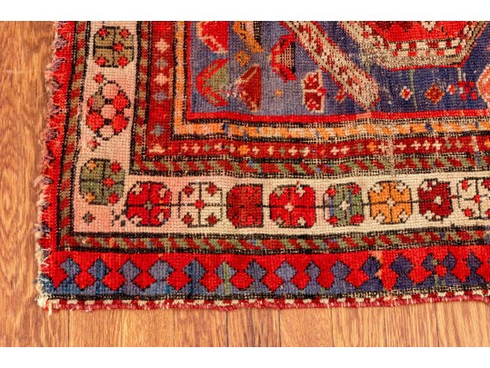 Group Of Four Hand-Knotted Carpets