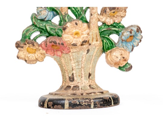 Two Antique Cast Iron Floral Basket Form Doorstops