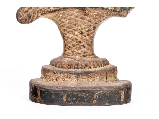 Two Antique Cast Iron Floral Basket Form Doorstops