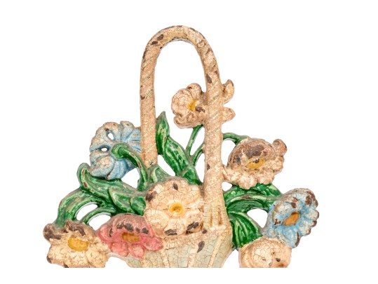 Two Antique Cast Iron Floral Basket Form Doorstops