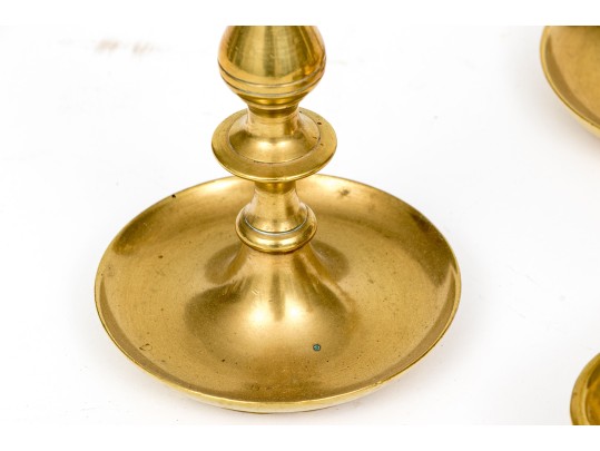 Four Brass Candlesticks And Chambersticks