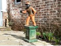 Antique Cast Iron Garden Jockey On Green Plinth